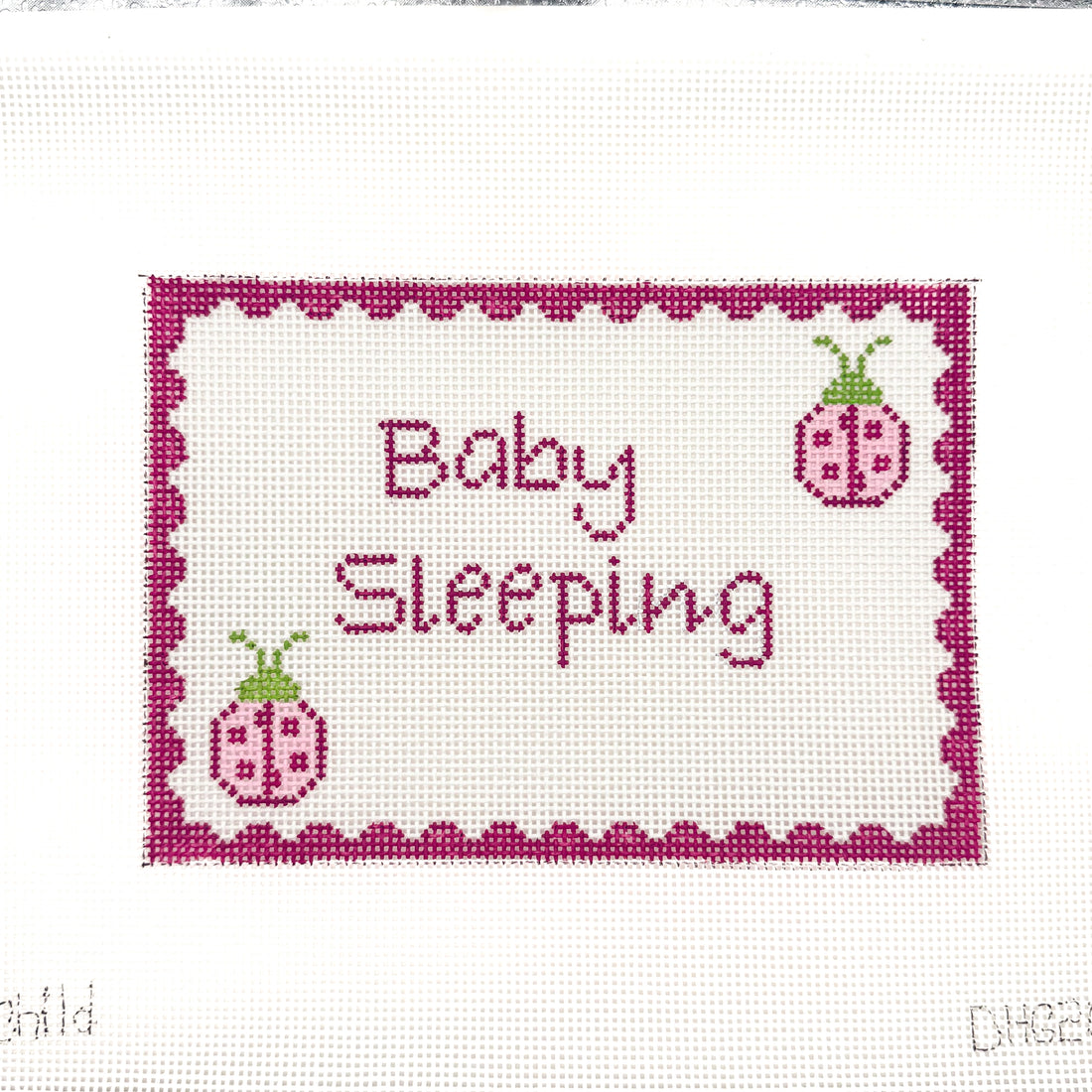 Ladybug Baby Sleeping needlepoint canvas by J Childs, 13 mesh 
5" x 7"