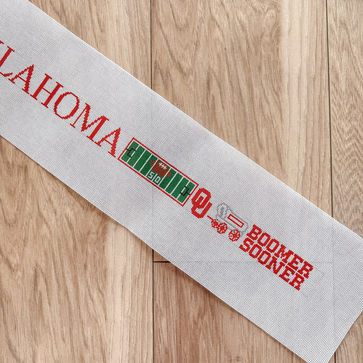 Oklahoma Field & Court-Long Belt needlepoint canvas by Elm Tree, 18 mesh 
<meta charset="UTF-8">1.25″ by 40″